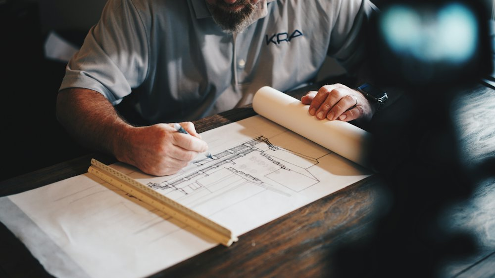 Engineer drafting construction plans